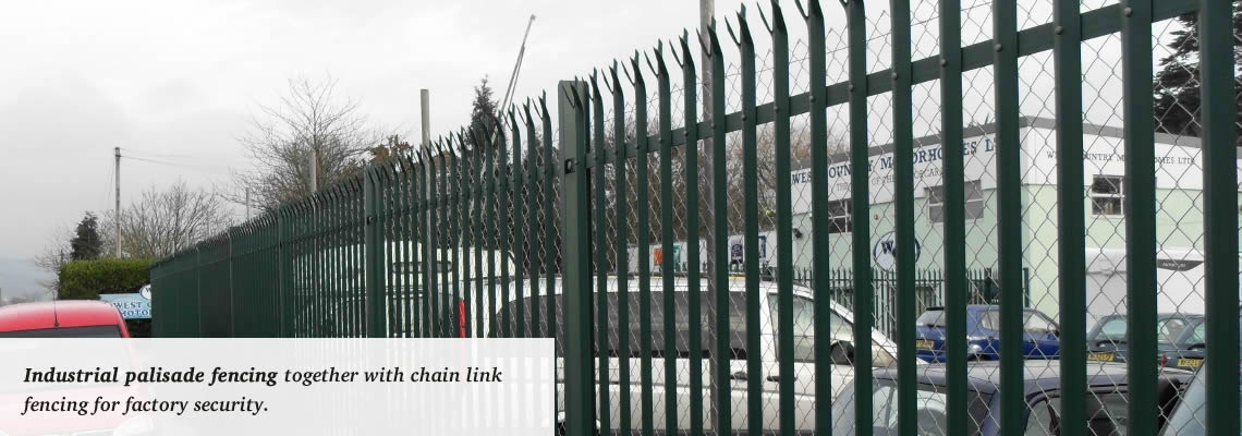 Industrial palisade fencing combined with chain link fencing